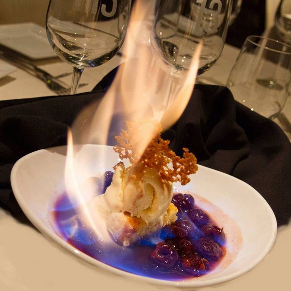 Flaming dessert with ice cream at Table 13
